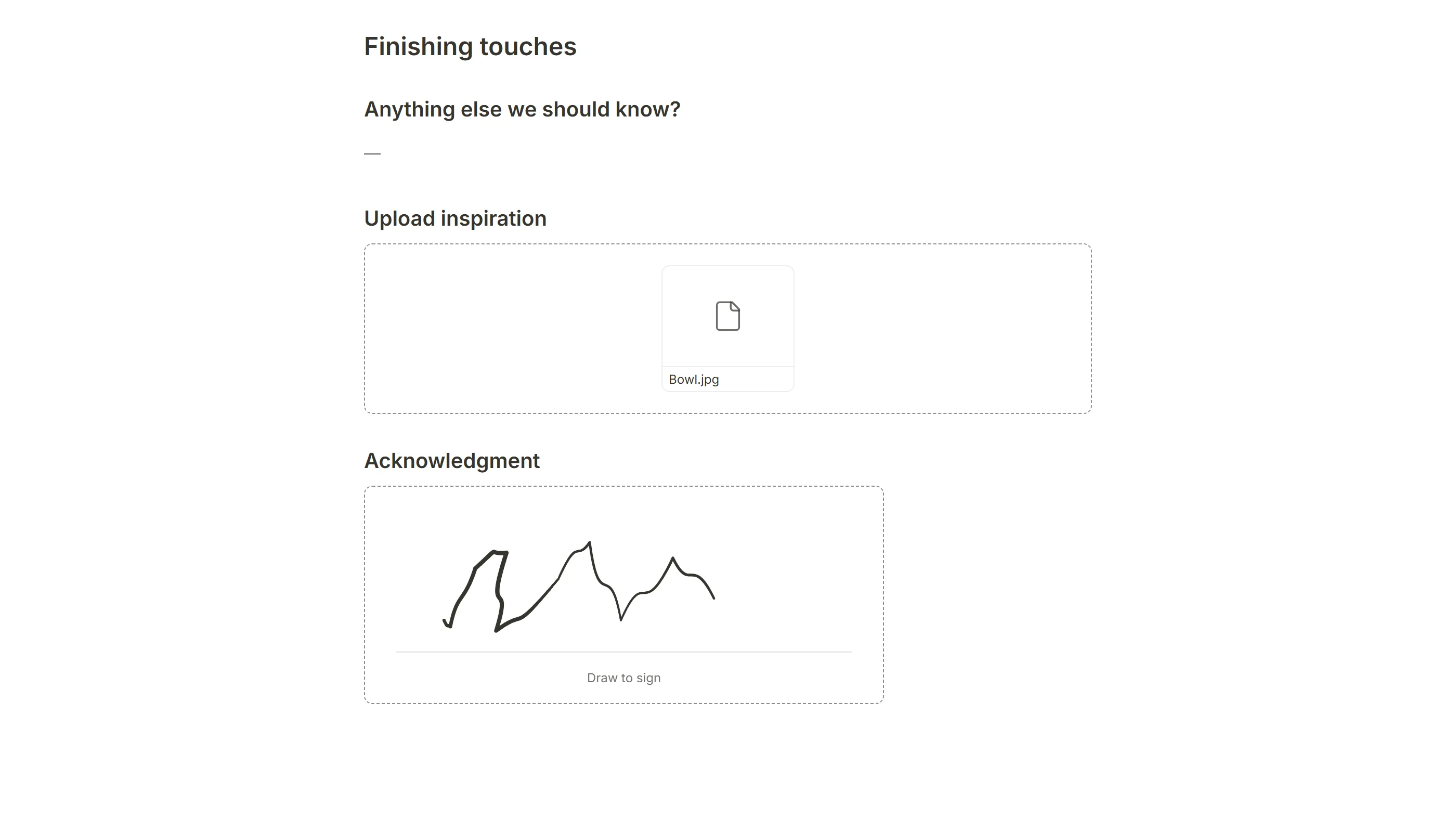 A printed submission on its second page: an unanswered question as a dash, the uploaded file listed by name and the signature drawn in place