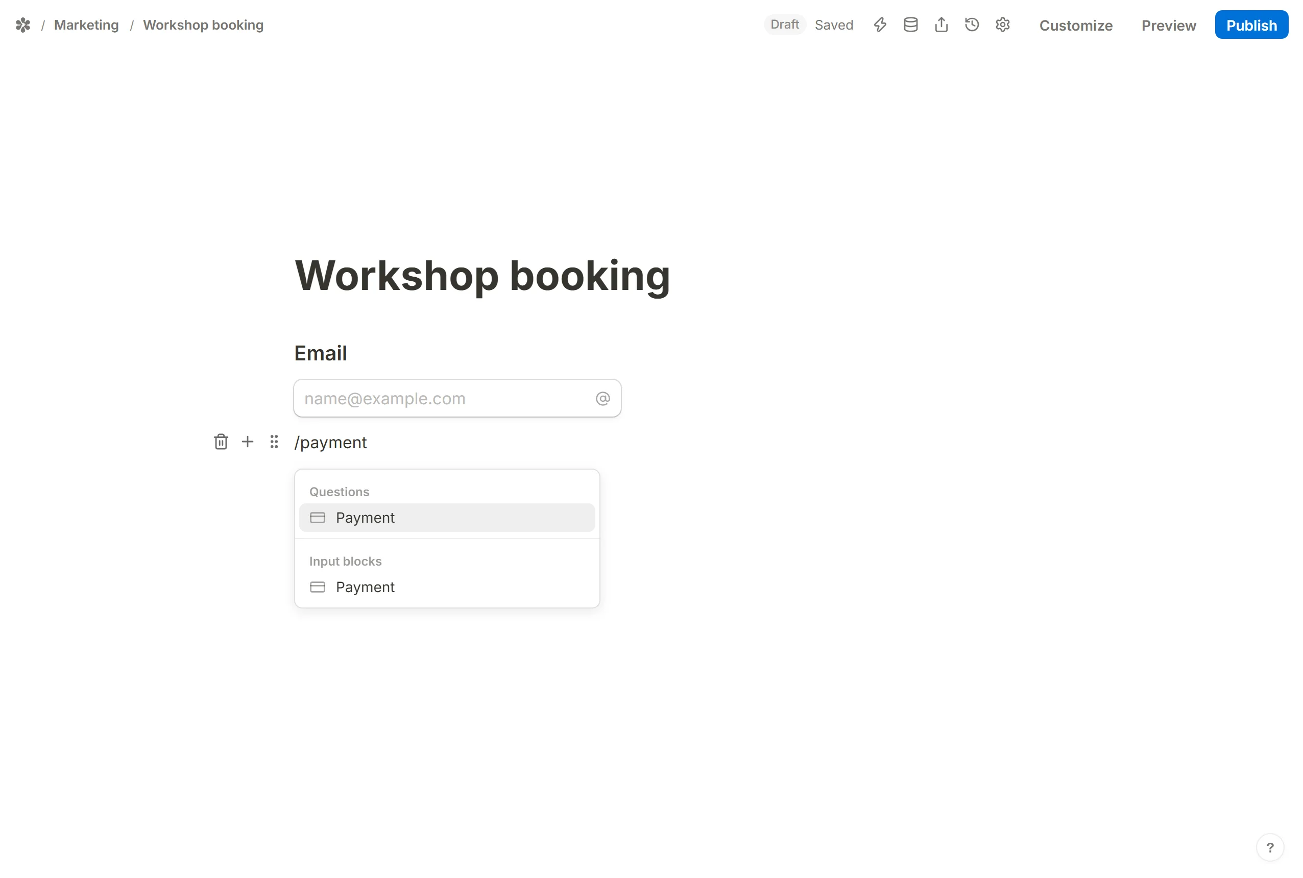 The block picker with Payment under Questions and again under Input blocks, opened by typing a slash